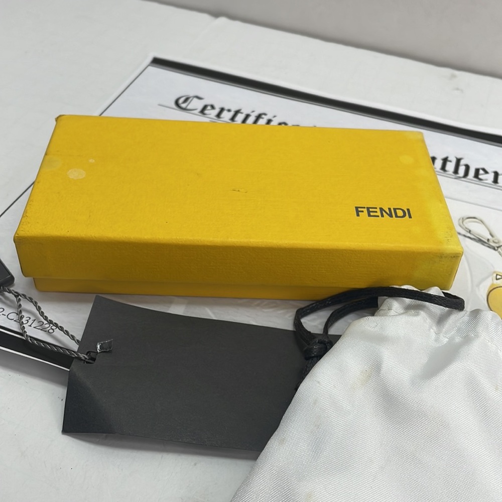Authentic FENDI raccoon/squirrel keychain, new with tags box and COA - Picture 6 of 9